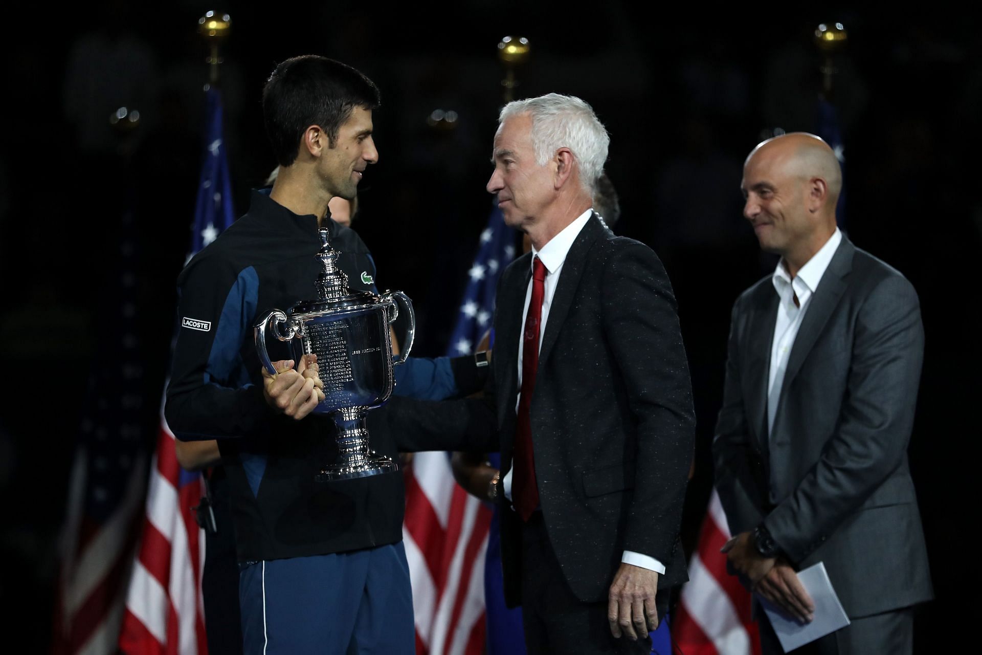 John McEnroe and Novak Djokovic at 2018 US Open
